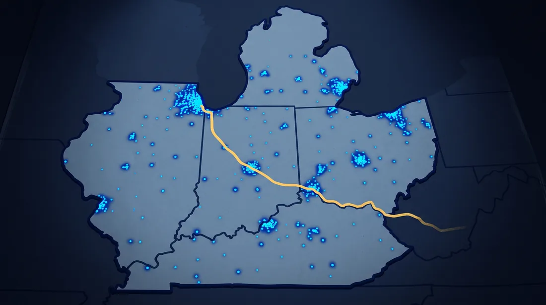 Five Midwestern states shaded as one mapped region, camera dots dense over the cities and sparse between them, a route line running through and continuing past the border into darkness.